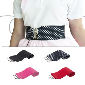 Adult woman wearing a stretchy vintage style cinch belt with silver metal clasp. Comes in black, black polka dot, hot pink and red.